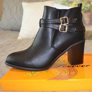 Black Booties with gold buckles